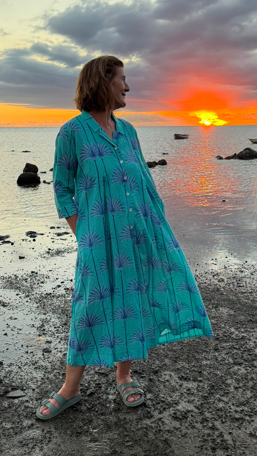 Jilly Jumpsuit Turquoise and White background with Blue Palms