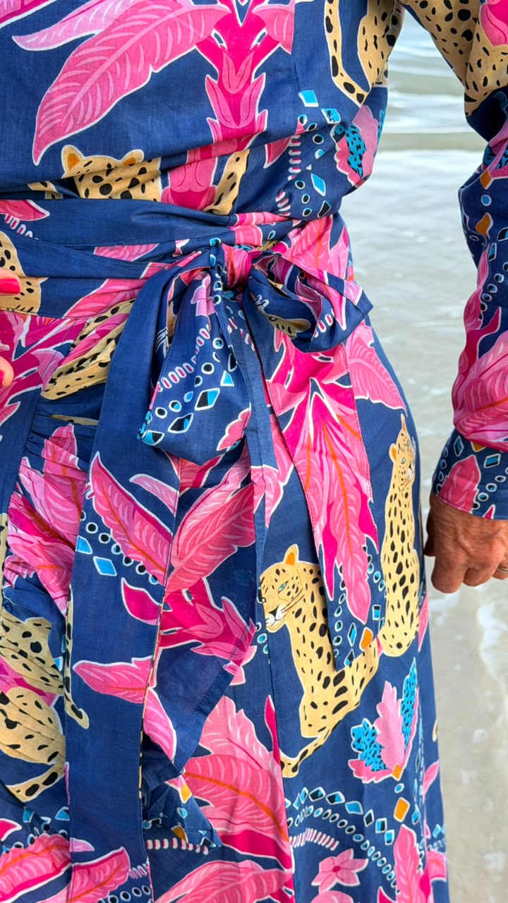 Cobalt blue with leopards and hot pink palms Close Up on beach