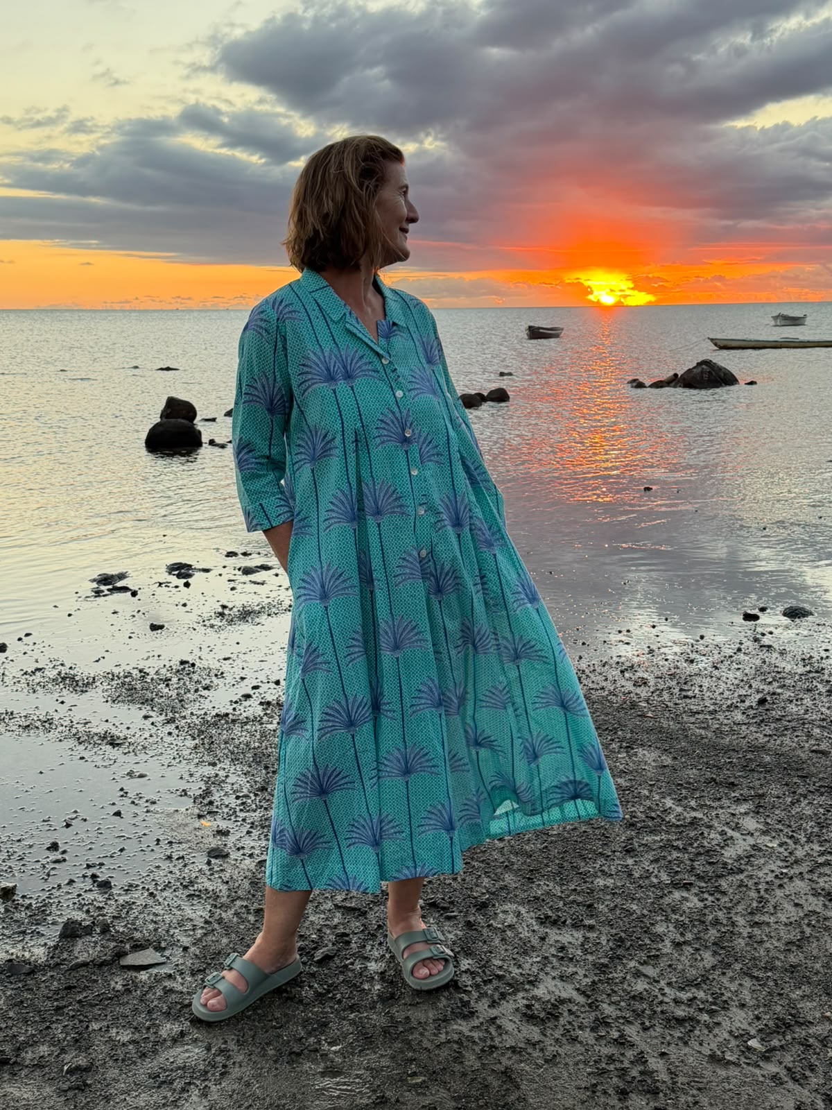 Jilly Jumpsuit Turquoise and White background with Blue Palms