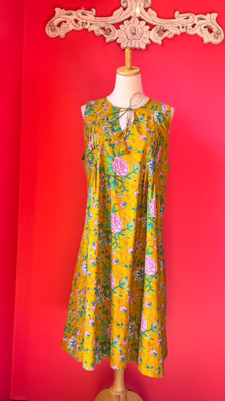 Ladies Nighties _ Mustard-Golden Yellow Base with Dense Floral in Soft Pink Roses and Rose-Like Blooms, Mixed with Smaller Pink Buds and Flowers. The Foliage is in Shades Of Green