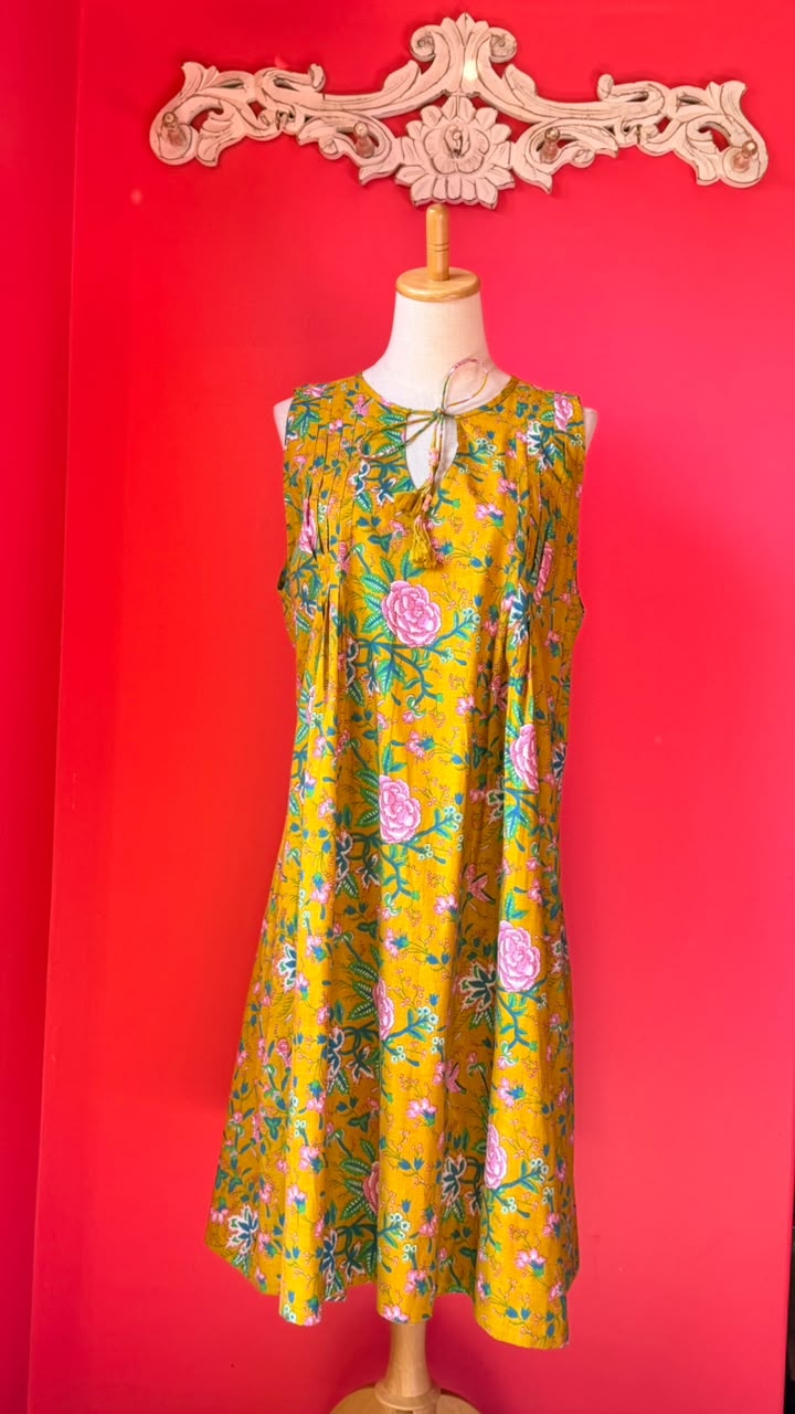 Ladies Nighties _ Mustard-Golden Yellow Base with Dense Floral in Soft Pink Roses and Rose-Like Blooms, Mixed with Smaller Pink Buds and Flowers. The Foliage is in Shades Of Green