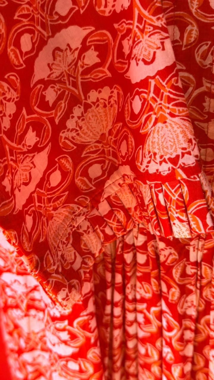 Sarah Lee Pleated Dress - Orange Background with Ornate white Flowers and Vines