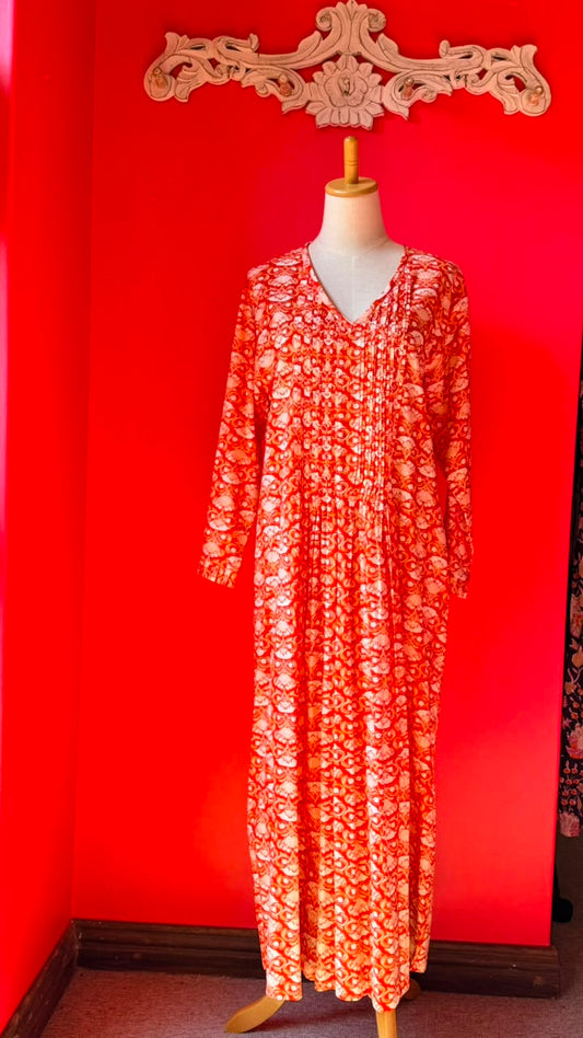 Sarah Lee Pleated Dress - Orange Background with Ornate white Flowers and Vines