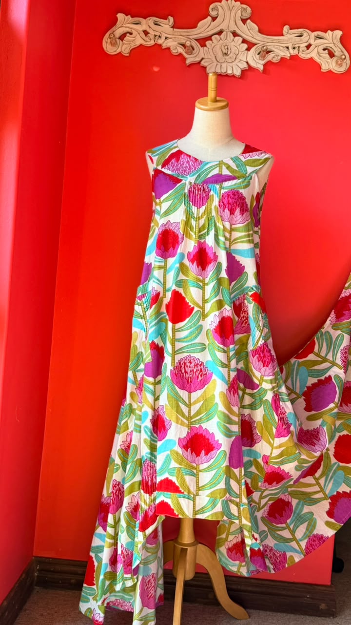 Bird Dress -  White Background with Bold and Bright Pink and Red Proteas and Turquoise Leaves