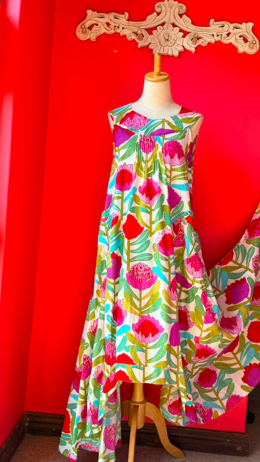 Bird Dress -  White Background with Bold and Bright Pink and Red Proteas and Turquoise Leaves