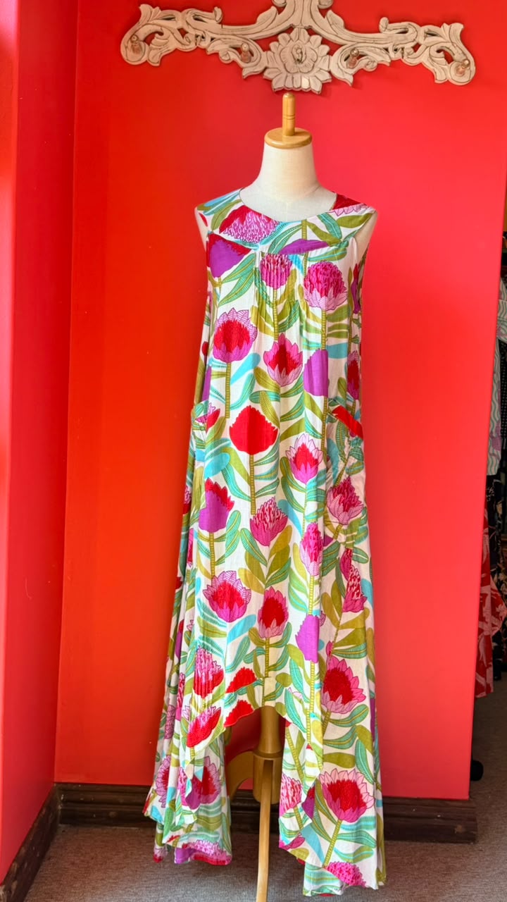 Bird Dress -  White Background with Bold and Bright Pink and Red Proteas and Turquoise Leaves